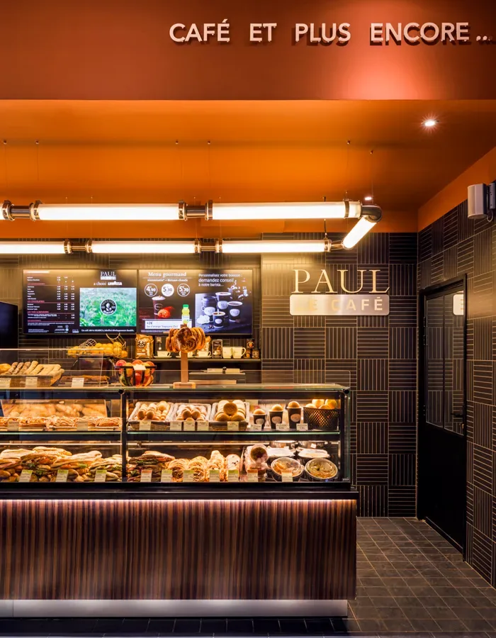 Fresh bakery goods and food provisions on display shelves